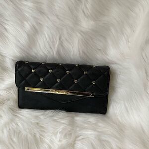 Betsey Johnson black quilted wallet with gold tone heart shape studs